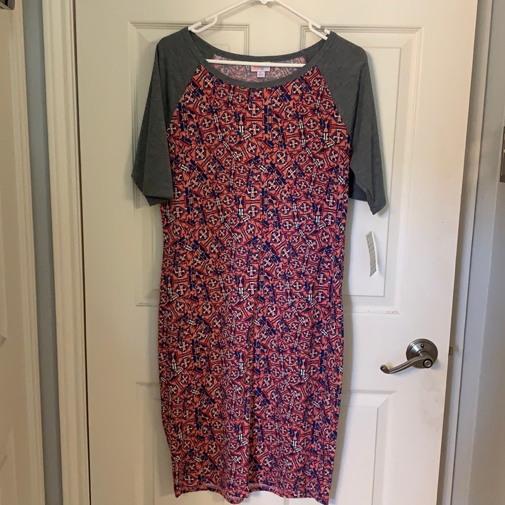 Lularoe Julia - print is pink, blue and cream.